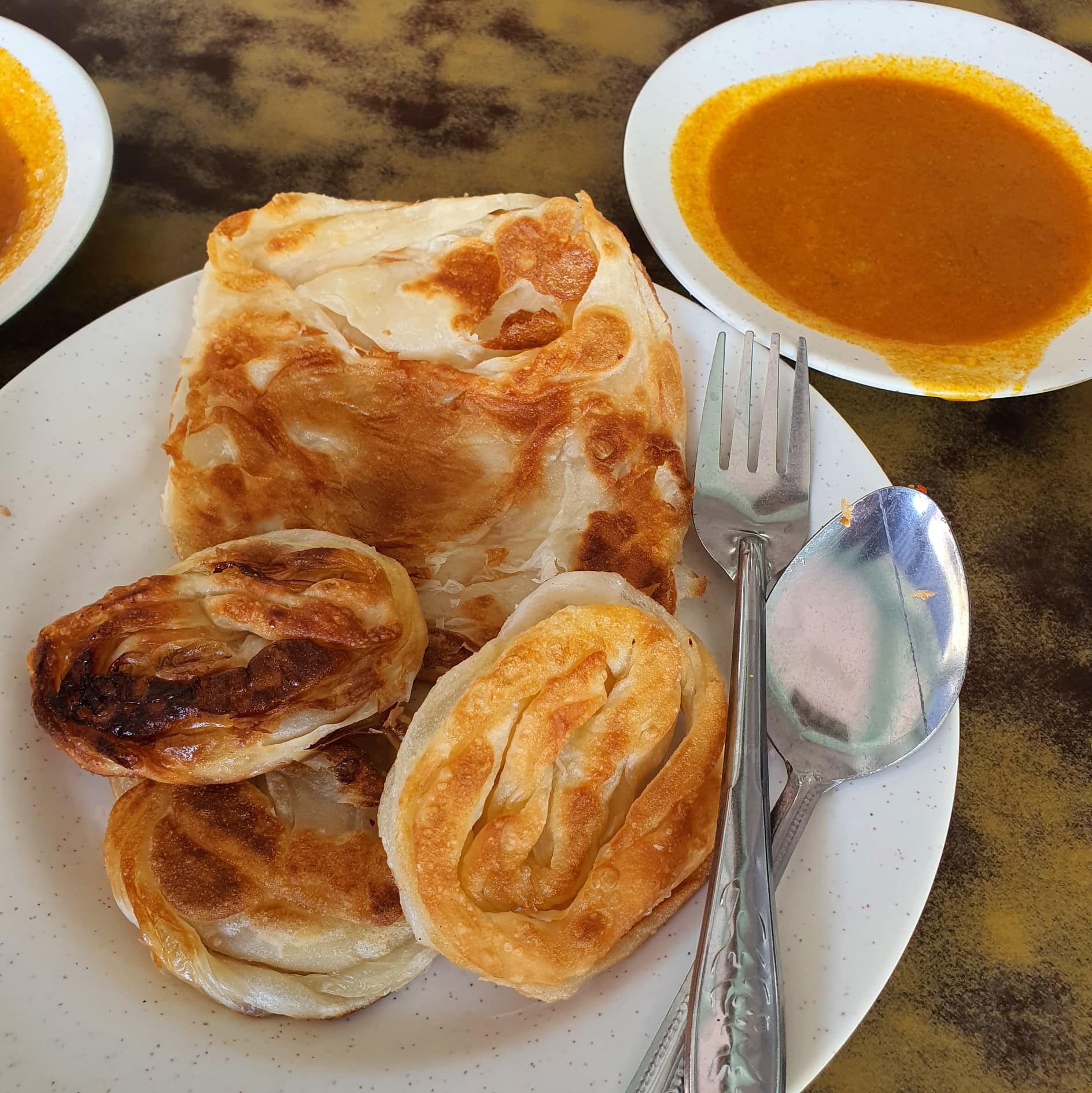 Mr. & Mrs. Mohgan, an Indian food stall that serves super crispy roti prata.